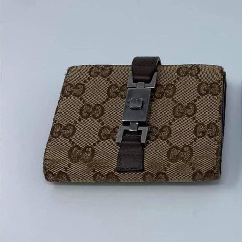 Authentic,Gucci monogram wallet with coin compartment and card slots. Preloved!